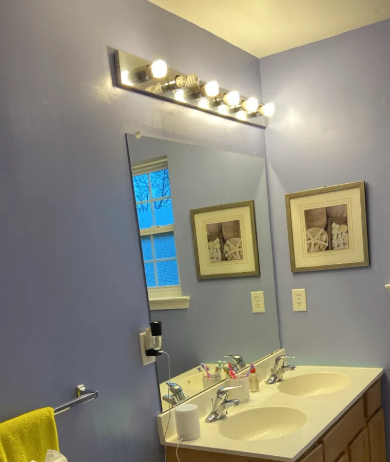 Bathroom vanity styled with folded towels after a Super Clean visit