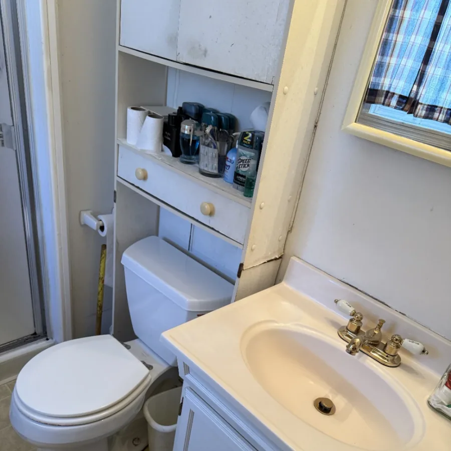 Same bathroom sanitized, decluttered, and shining after Super Clean