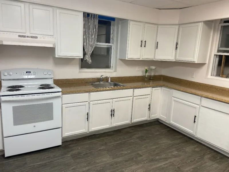 Kitchen cabinets, counters, and floor cleaned top to bottom