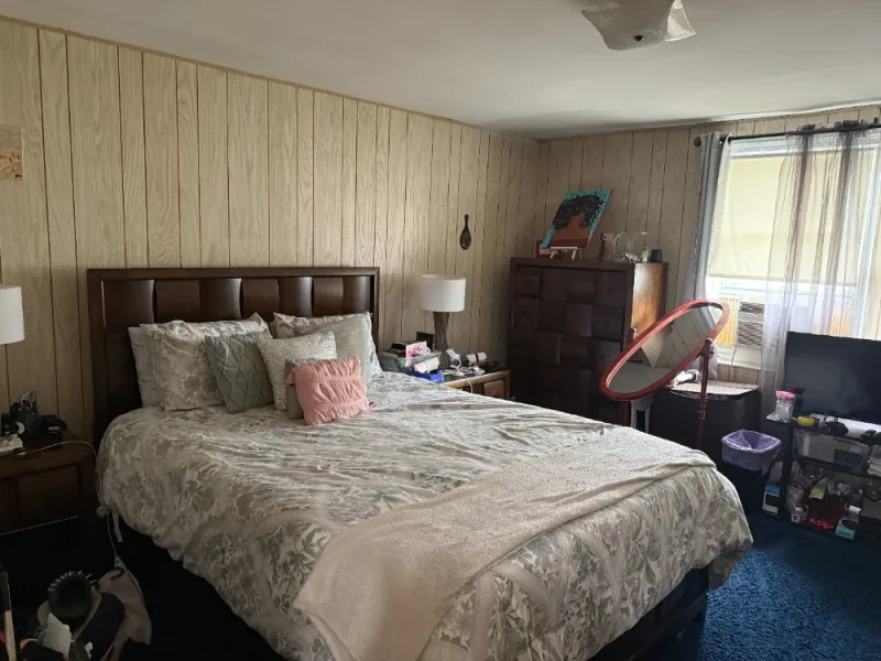 Guest bedroom cleaned and made up, ready for arrival